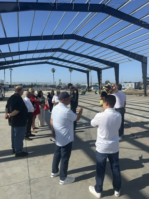 Alfredo Rodriguez with volunteers before a neighborhood walk