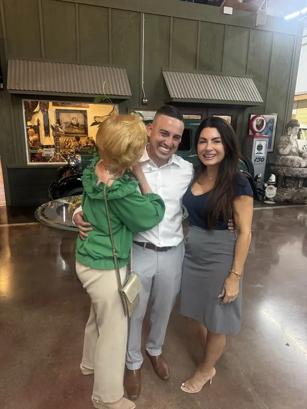 Alfredo Rodriguez sharing a laugh with supporters