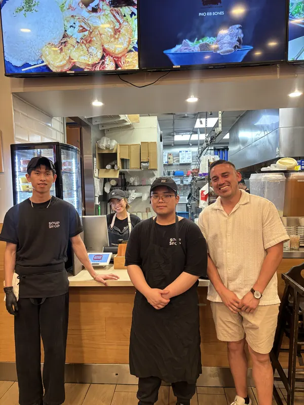 Alfredo Rodriguez with the team at a local restaurant