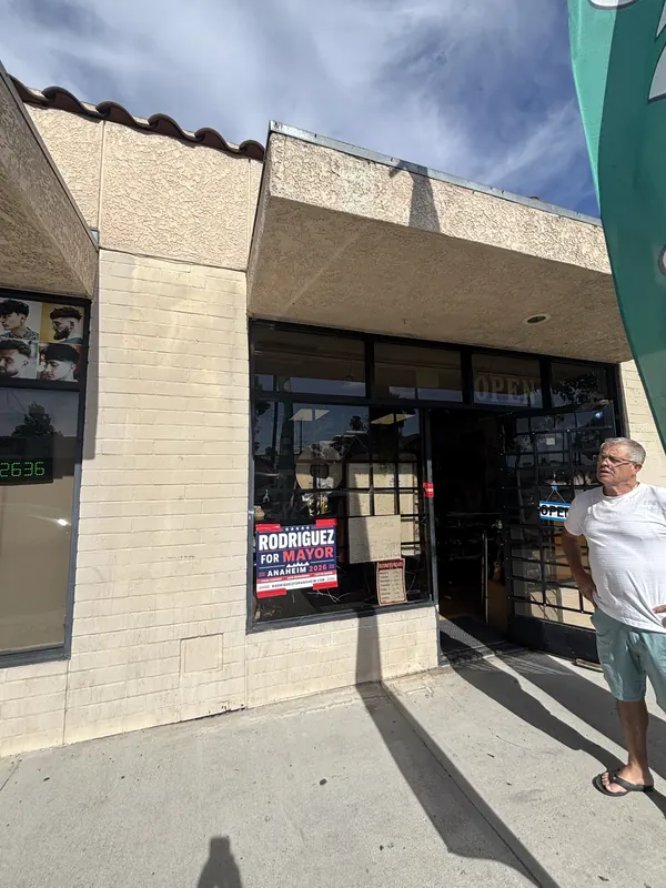 Alfredo Rodriguez outside a local storefront